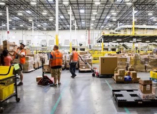 While businesses are suffering, Amazon looks to hire 100k workers to help with increased online orders amazon warehouse